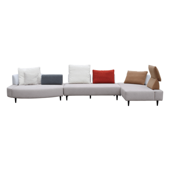 Modern sectional sofa with multi-colored cushions.