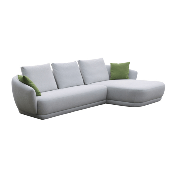 Contemporary L-shaped gray sofa with green cushions.