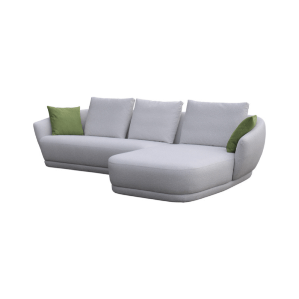 Modern gray fabric sectional sofa with green accent pillows.