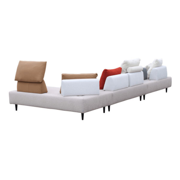 Back view of a modular sofa with diverse cushion colors.