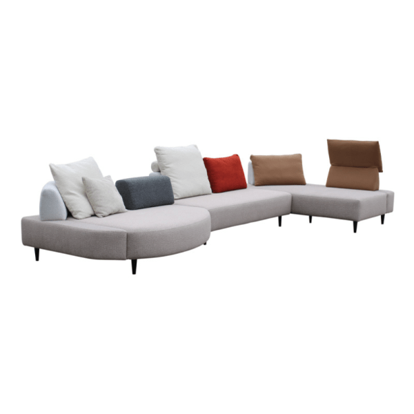 Contemporary L-shaped sofa with a variety of cushions.